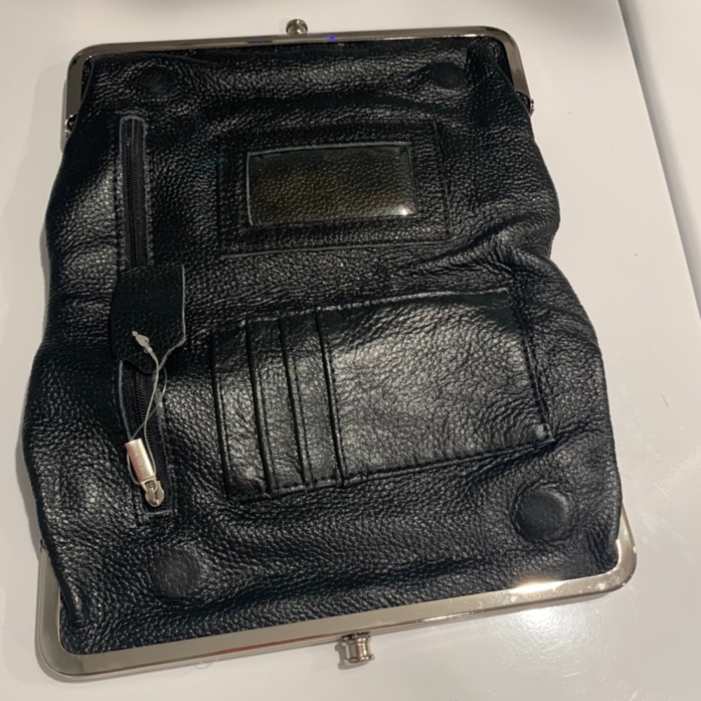 EUC Genuine black leather clutch! Maybe used once? Opens up fully